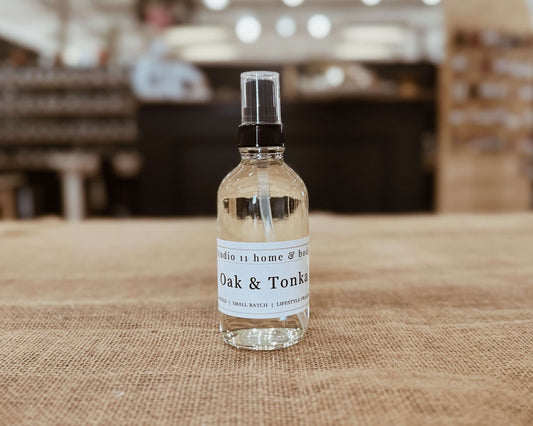 Transform your space with this premium oak and tonka room spray. Clean formula delivers lasting sophisticated fragrance. By Studio 11 Home & Body in Huntsville AL