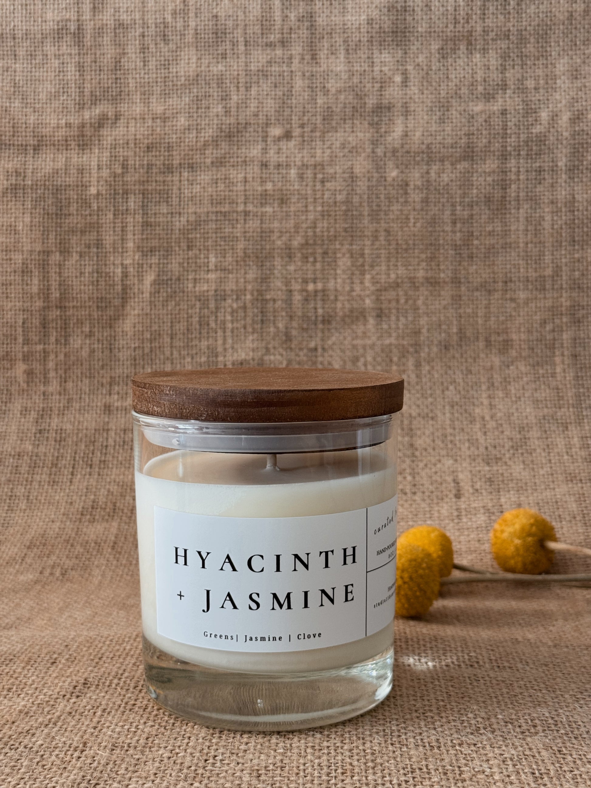 Fresh garden air and blooming florals come together in Hyacinth + Jasmine, a refined spring fragrance inspired by sunlit gardens just beginning to bloom. Crisp green stems and delicate hyacinth petals unfold into soft jasmine blossoms, while a subtle touch of warm clove adds depth and quiet sophistication.