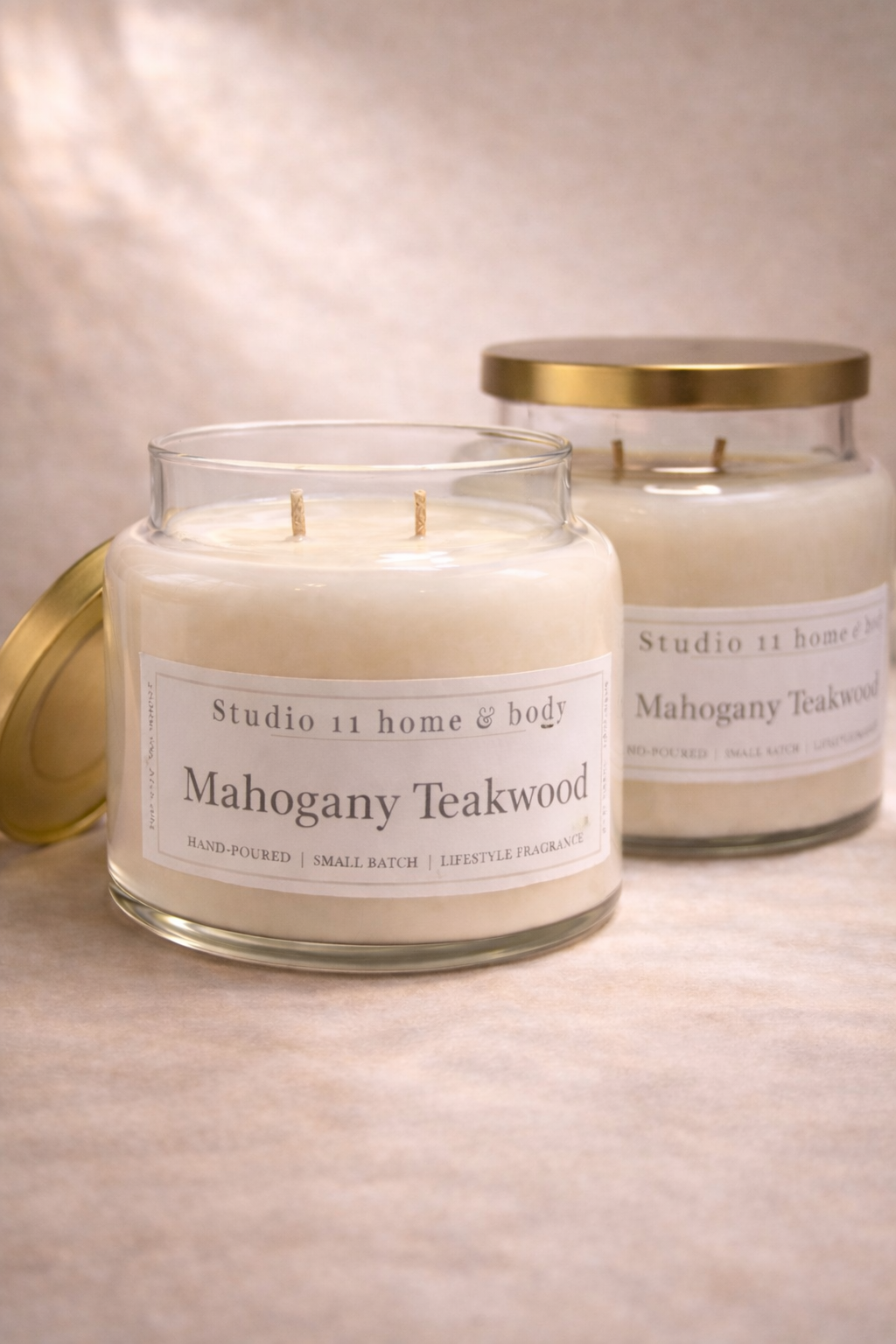 Warm • Polished • Modern Woods

A rich, wood-forward candle that brings depth and quiet confidence to any space. Our Mahogany Teakwood fragrance blends smooth mahogany with warm teakwood and subtle undertones that feel refined, grounded, and effortlessly masculine—without overpowering the room.

Hand-poured in small batches, this candle is made with 100% soy wax and clean, non-toxic fragrance oils for a slow, even burn and a balanced scent throw. 

