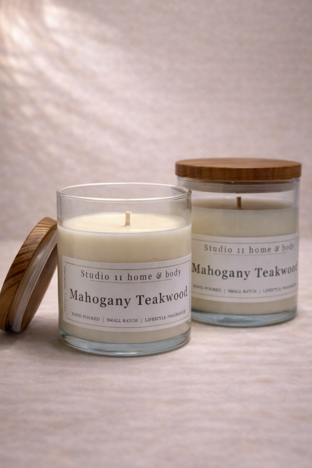 Warm • Polished • Modern Woods

A rich, wood-forward candle that brings depth and quiet confidence to any space. Our Mahogany Teakwood fragrance blends smooth mahogany with warm teakwood and subtle undertones that feel refined, grounded, and effortlessly masculine—without overpowering the room.

Hand-poured in small batches, this candle is made with 100% soy wax and clean, non-toxic fragrance oils for a slow, even burn and a balanced scent throw. 
