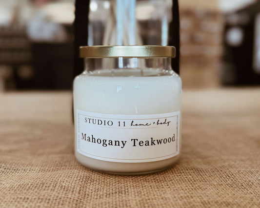 Premium soy candle with mahogany and teakwood notes, handcrafted at Studio 11 Home and Body in Huntsville AL