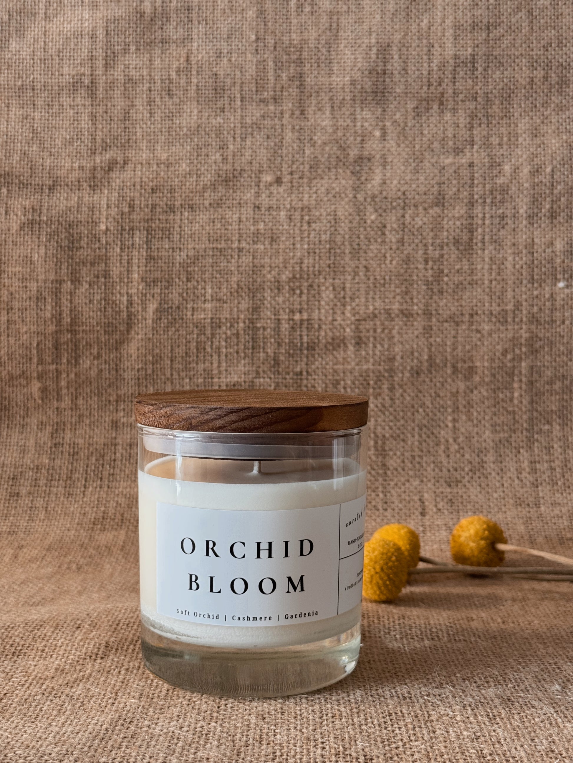 Orchid Bloom is a soft, elegant floral fragrance inspired by the delicate beauty of blooming orchids and warm spring air. Notes of silky orchid petals blend with creamy gardenia and subtle cashmere musk, creating a scent that feels refined, comforting, and quietly luxurious.