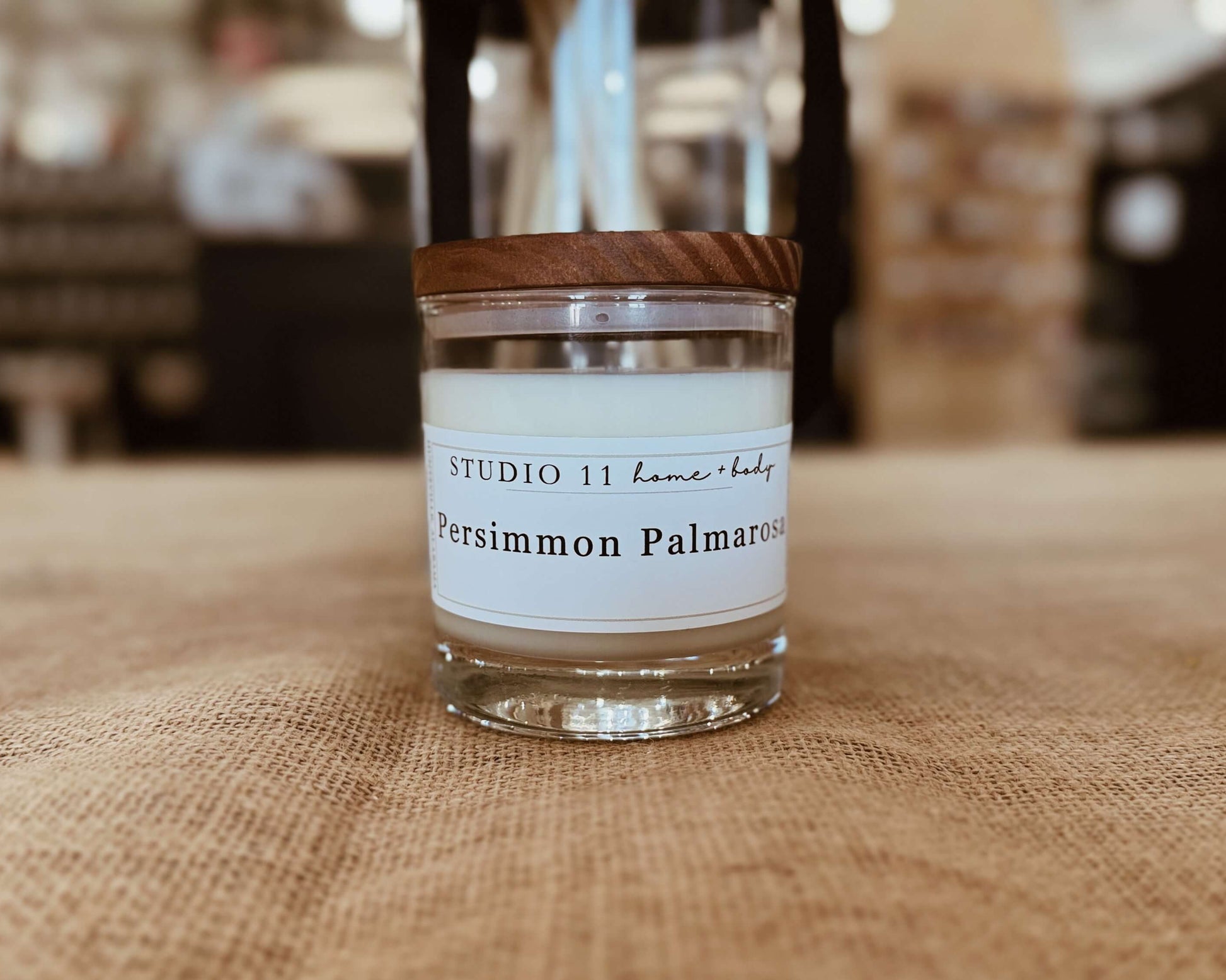 Artisanal soy candle featuring persimmon and palmarosa scents, handmade by Studio 11 Home and Body in Huntsville AL