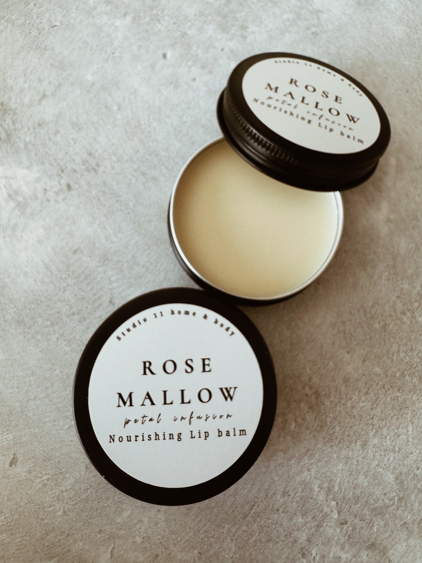 Transform dry, chapped lips with our Rose Mallow Lip Balm — a deeply hydrating, botanical lip treatment crafted with shea butter, beeswax, jojoba oil, fractionated coconut oil, and vitamin E for soft, smooth, nourished lips that last.

This luxury lip balm melts effortlessly into the skin, delivering long-lasting moisture without a greasy feel. Designed for daily use, it helps restore dry lips while leaving behind a soft, natural glow.