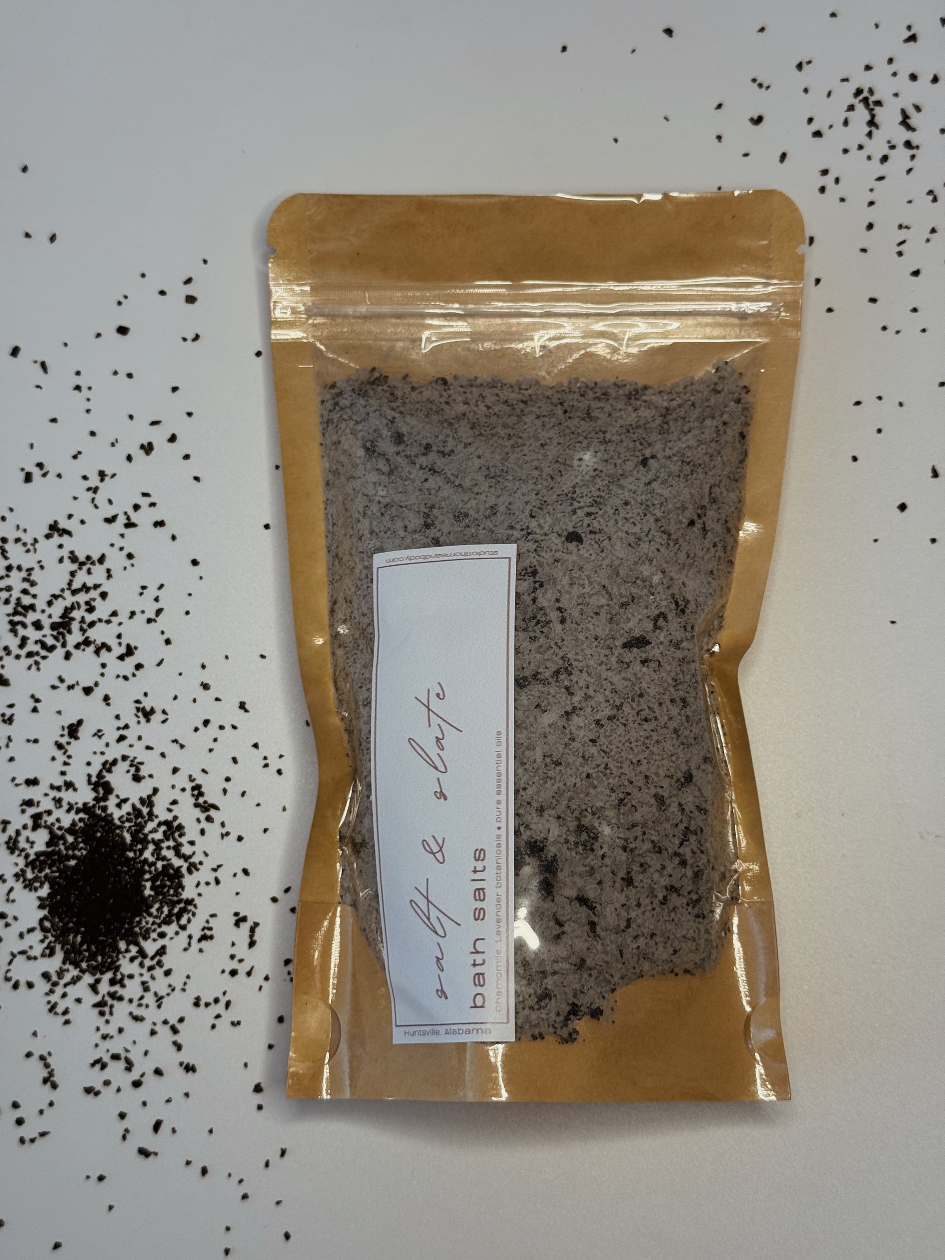 A grounding mineral bath soak with black sea salt, charcoal, and sea clay designed to detox, soften skin, and create a deeply restorative spa routine.