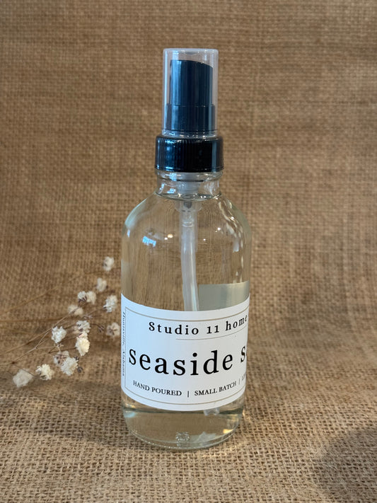 Delicate notes of sea salt and soft florals blend effortlessly with a smooth, clean base, creating a fresh, beach-inspired aroma that feels both uplifting and calming. Light yet noticeable, this mist leaves a soft, lingering scent on linens, skin, and throughout your space—never overpowering, always refined.