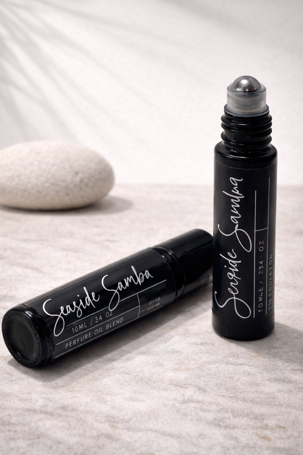 Seaside Samba is a fresh, coastal pulse point fragrance inspired by sea air and soft florals. Airy sea salt opens the scent with a clean, breezy feel, followed by delicate orchid and subtle floral notes. A light, warm base keeps the fragrance smooth and balanced, creating an effortless, skin-close finish.