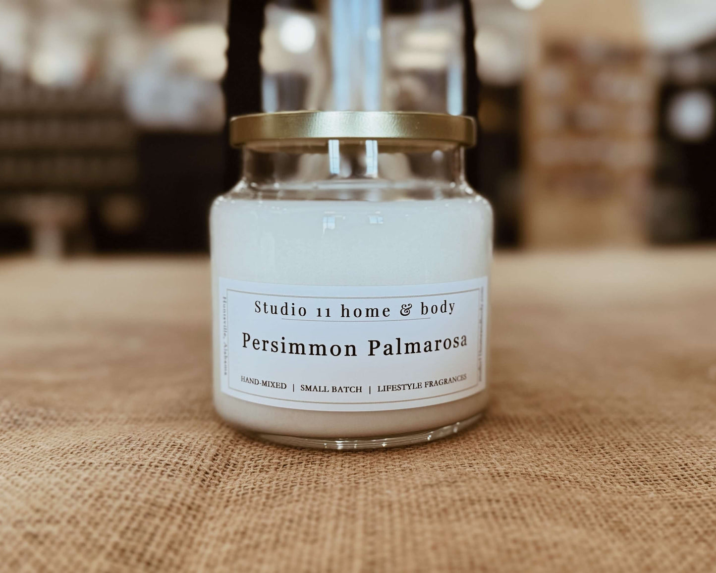 Artisanal soy candle featuring persimmon and palmarosa scents, handmade by Studio 11 Home and Body in Huntsville AL