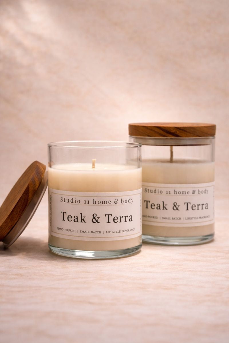 Teak & Terra is a rich, grounding candle that blends deep teakwood with smooth oud and subtle herbaceous greens. Soft notes of spiced tobacco leaf add warmth and depth, creating a refined, wood-forward fragrance that feels calm, balanced, and quietly luxurious.

Hand-poured in small batches using 100% soy wax and clean, non-toxic fragrance oils, this candle delivers a slow, even burn with a smooth, lingering scent throw. Teak & Terra is ideal for those drawn to earthy, masculine, or unisex home fragrances t