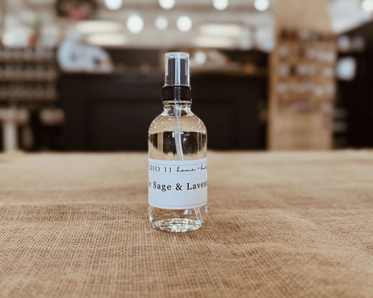 Natural white sage and lavender room mist by Studio 11 Home and Body, featuring essential oils of chamomile and lavender, crafted in Huntsville AL